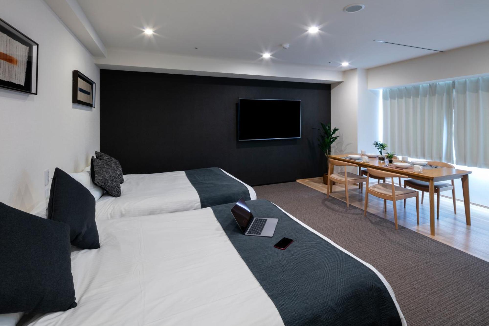 Randor Hotel Sapporo Suites Zimmer foto A typical room at the hotel
