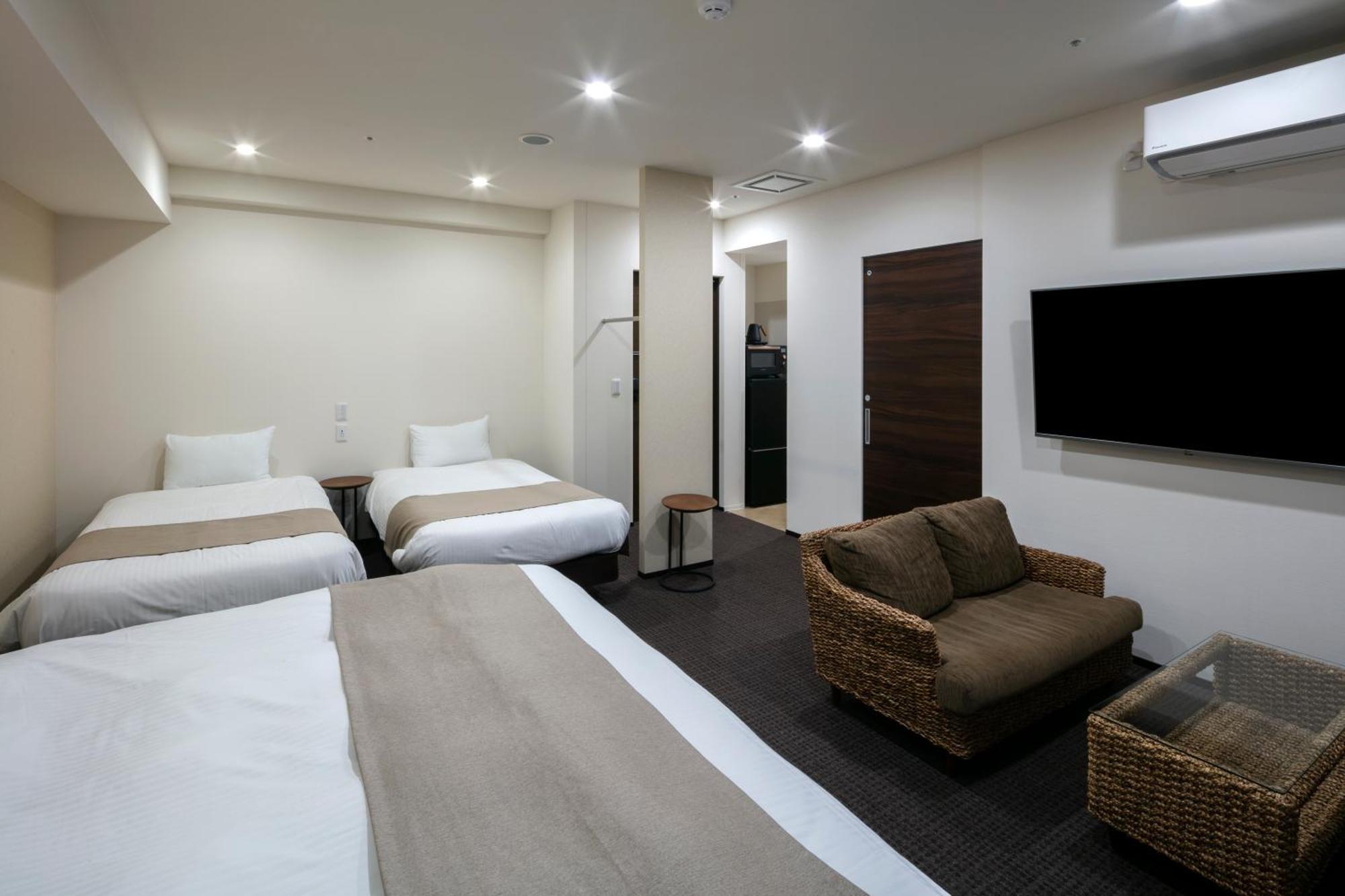 Randor Hotel Sapporo Suites Zimmer foto A typical room at the hotel